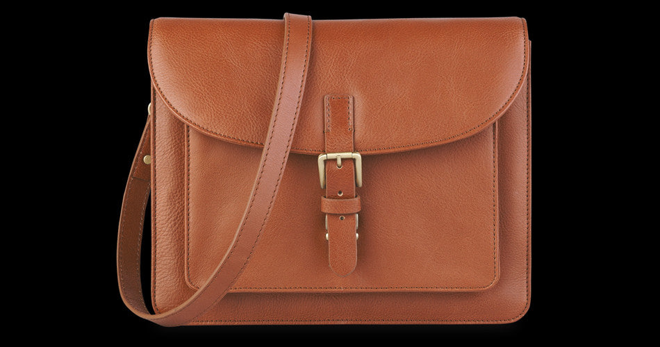 Toffee Covers Up Two Tablet Simultaneously With the Mini Leather Bag